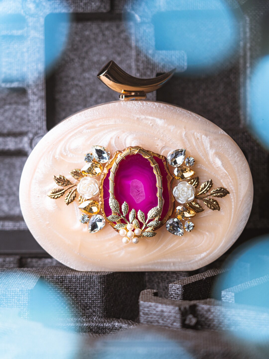 

NR By Nidhi Rathi Peach-Coloured & Pink Embellished Box Clutch