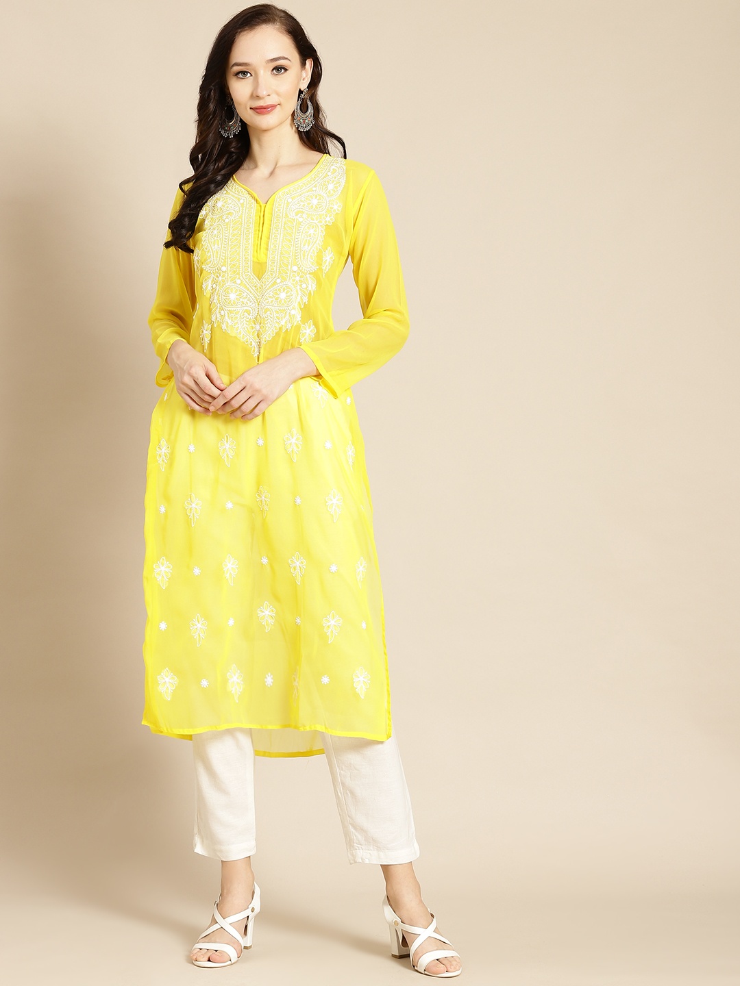 

Saadgi Women Yellow Floral Embroidered Georgette Handloom Georgette Kurta