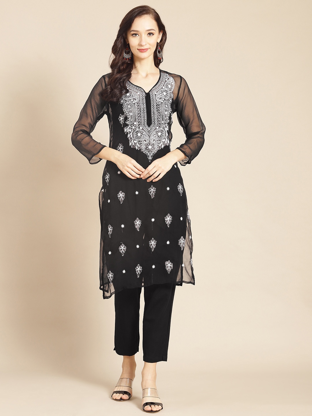 

Saadgi Women Black Floral Embroidered Georgette Handloom Georgette Kurta