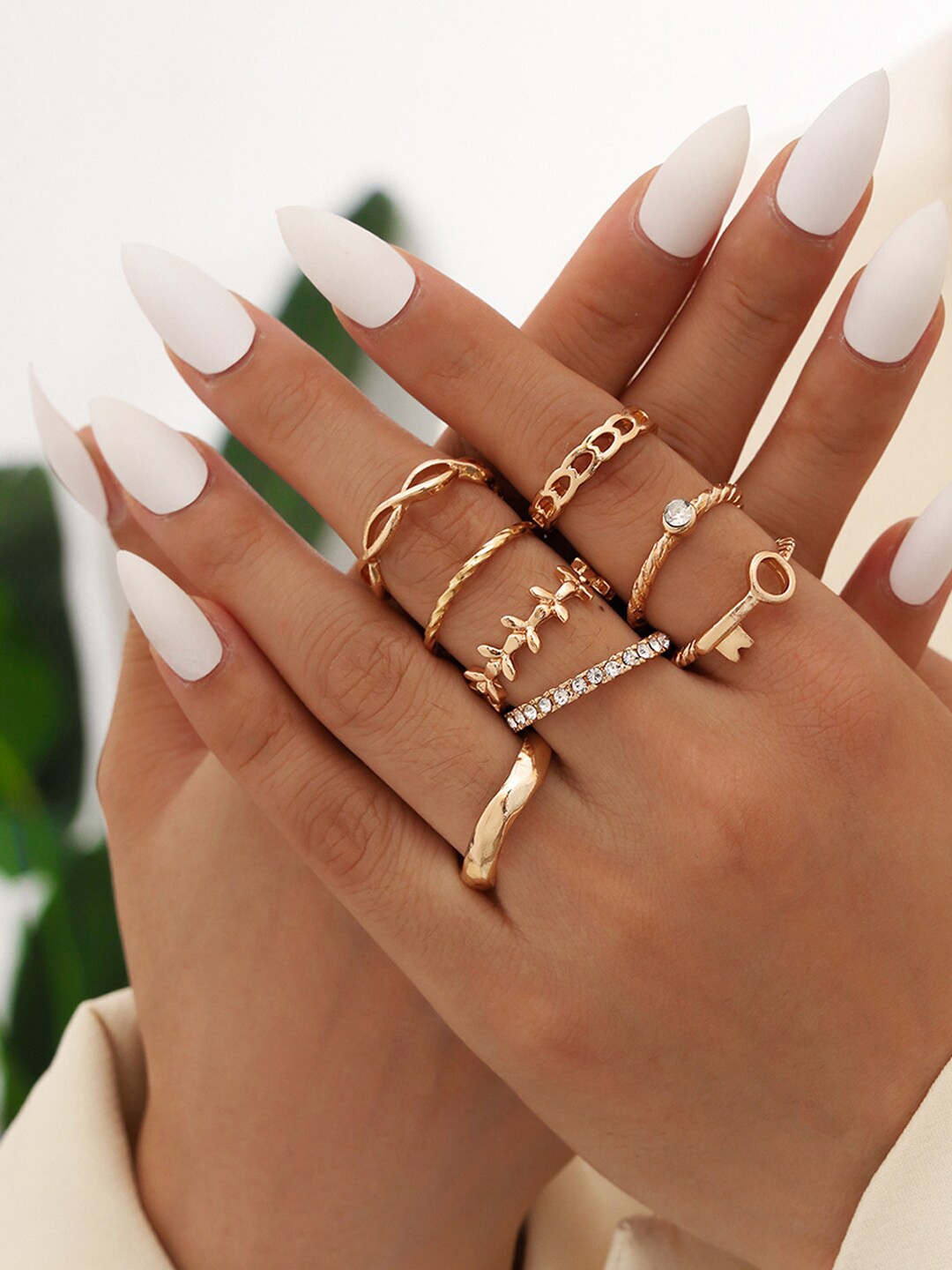 

Shining Diva Fashion Women Set Of 8 White Rose Gold-Toned Alloy Studded Finger Rings