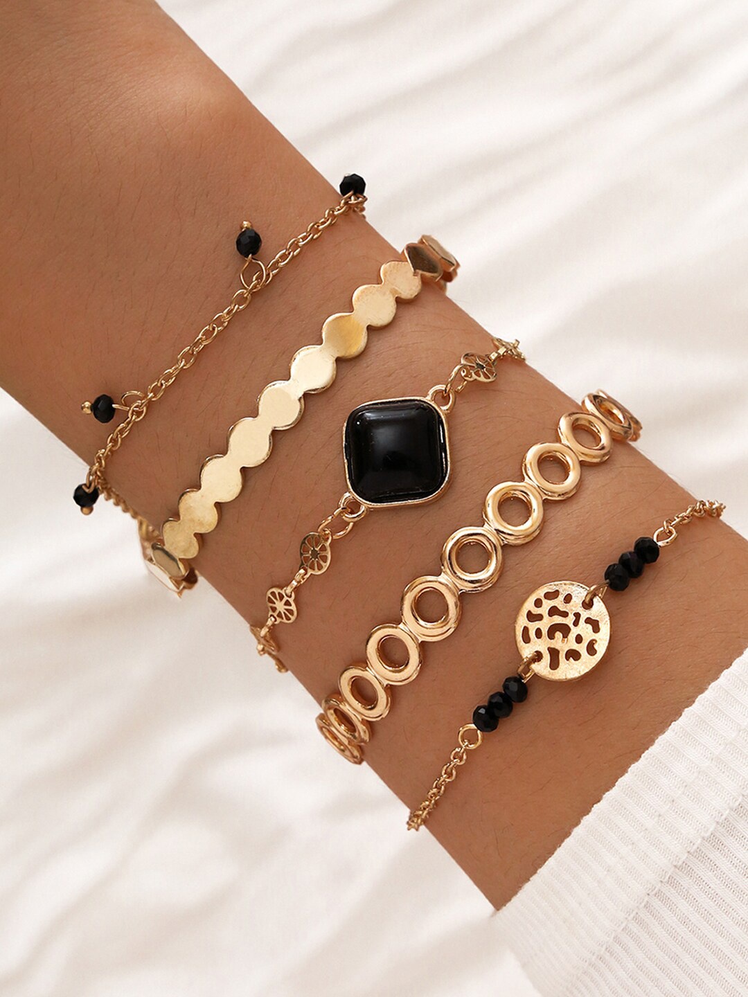 

Shining Diva Fashion Women Set Of 5 Black-Toned Gold-Plated Charm Bracelets