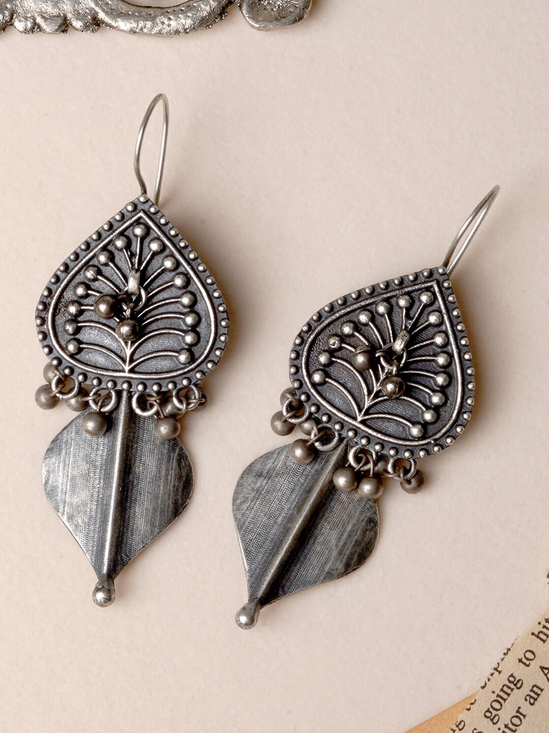 

TEEJH Silver-Plated Leaf Shaped Jhumkas Earrings