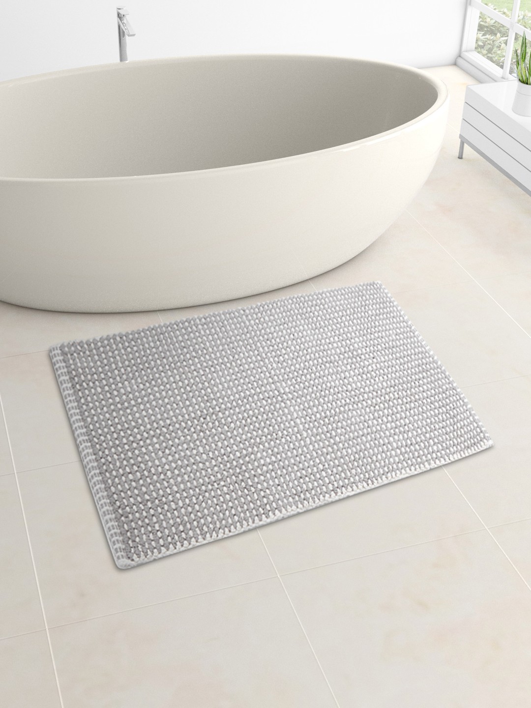 

Living scapes by Pantaloons Grey Self Design Pure Cotton Bath Rug