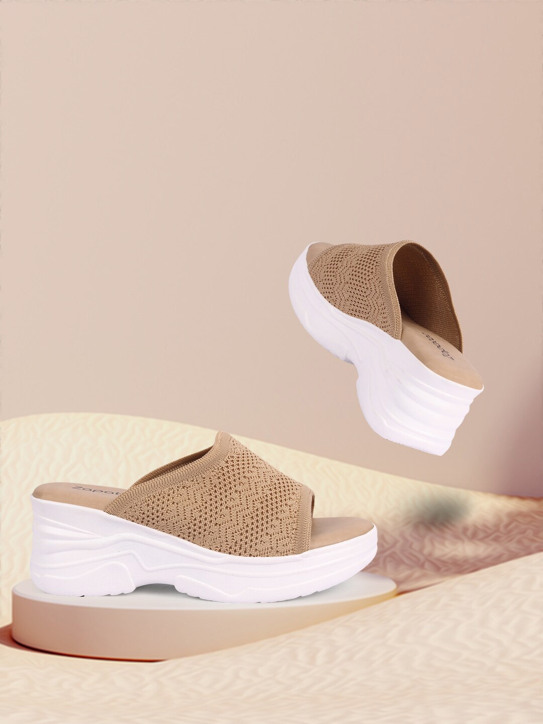 

ZAPATOZ Women Beige Textured PU Wedges with Laser Cuts