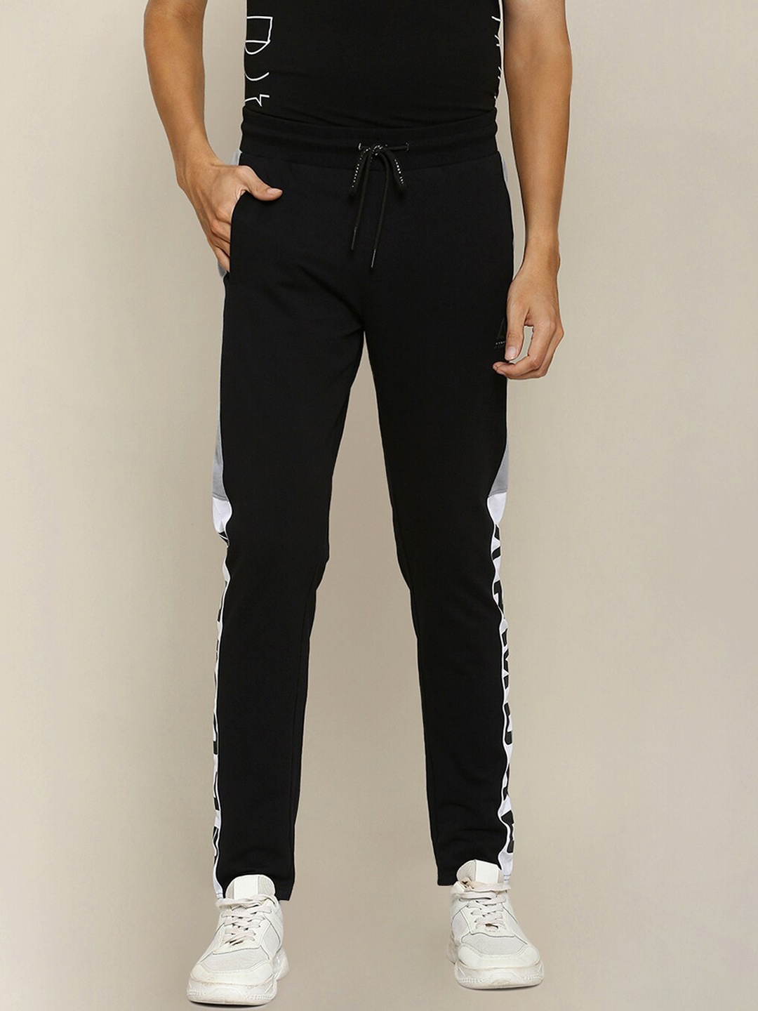 

Street Armor by Pantaloons Men Black & White Graphic Printed Slim-Fit Track Pants