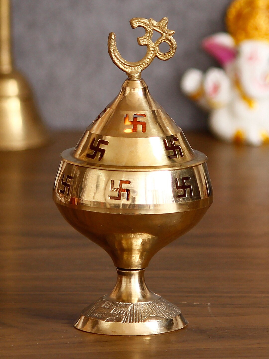 

eCraftIndia Gold-Toned Om and Swastik Brass Diya