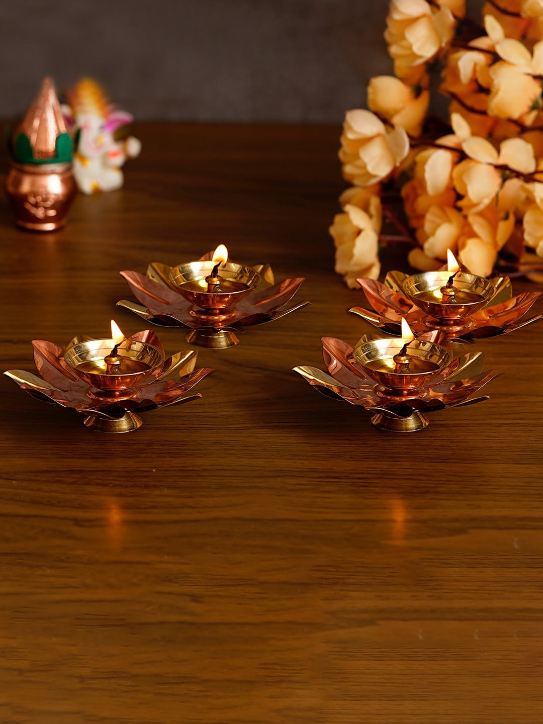 

eCraftIndia Set of 4 Floral Shape Metal Diya, Brown