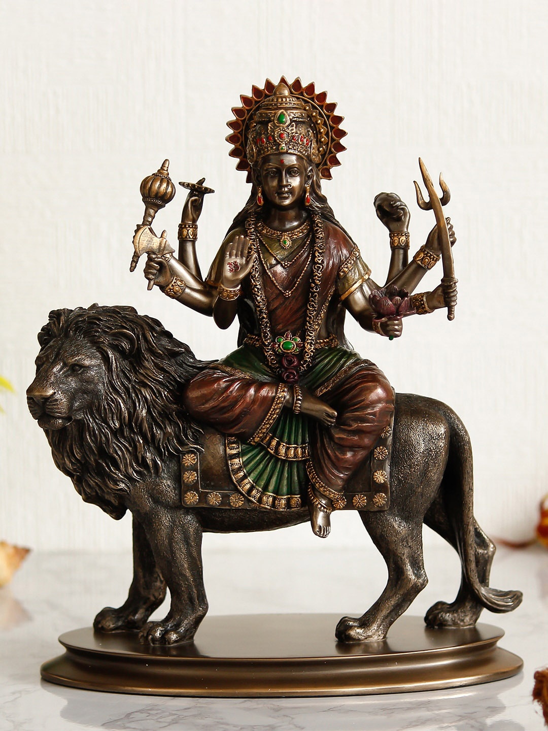 

eCraftIndia Brown Handcrafted Goddess Durga On Lion Cold Cast Figurine Showpiece