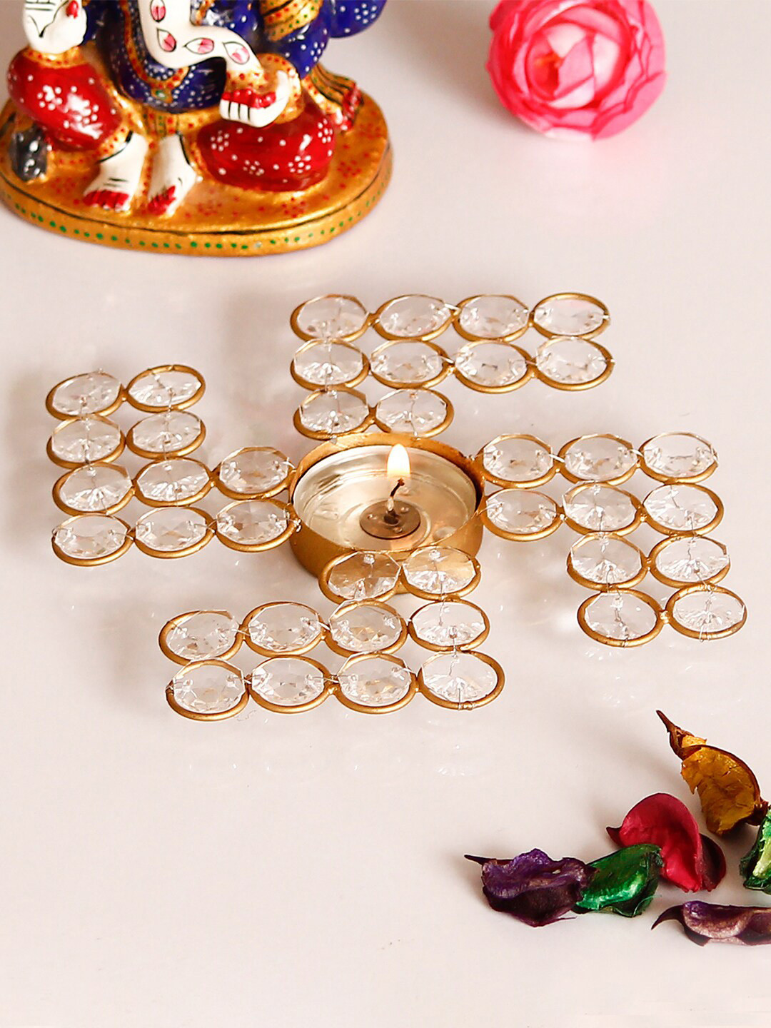 

eCraftIndia Gold-toned Crystal Swastik Tea Light Holder