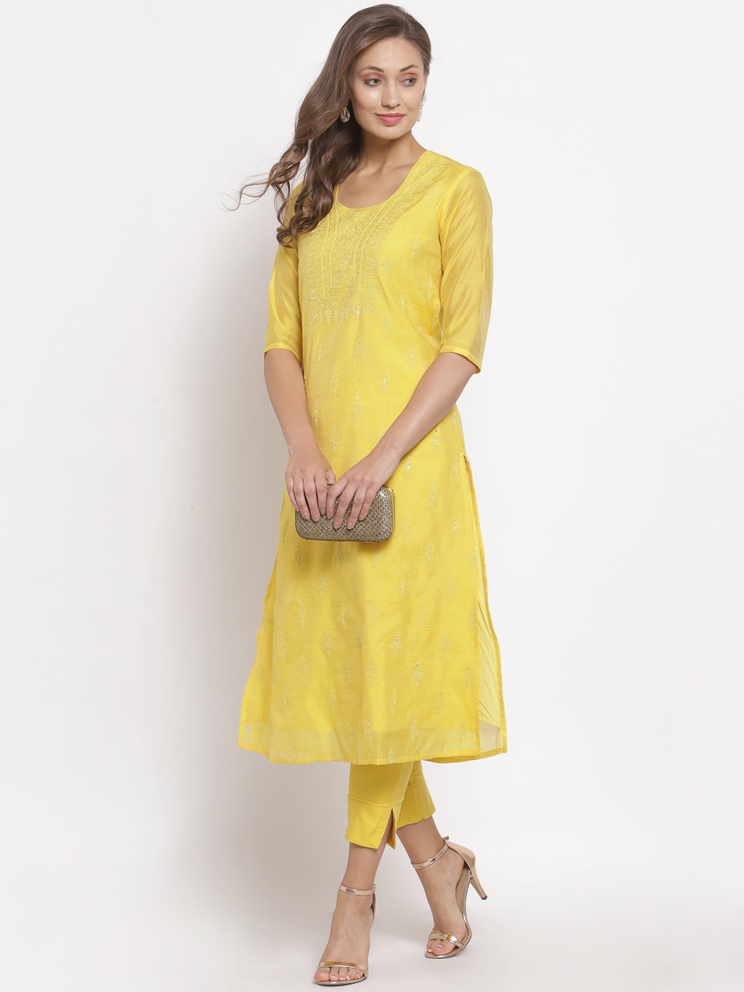 

Desi Weavess Women Yellow Ethnic Motifs Regular Sequinned Kurta with Trousers