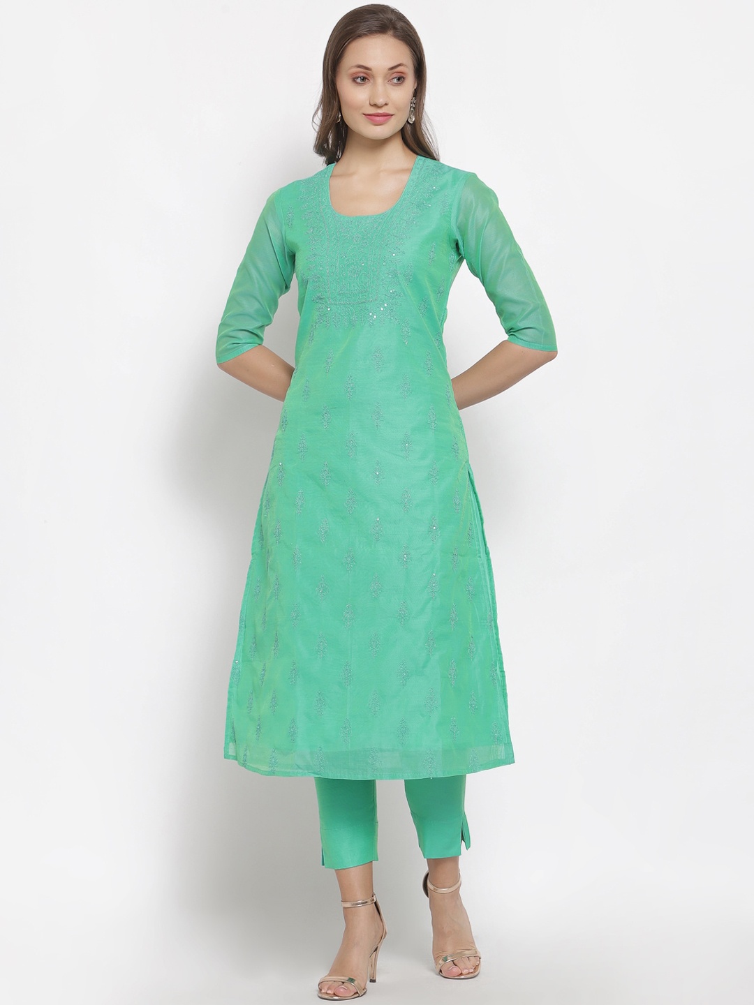 

Desi Weavess Women Teal Embroidered Regular Kurta with Trousers