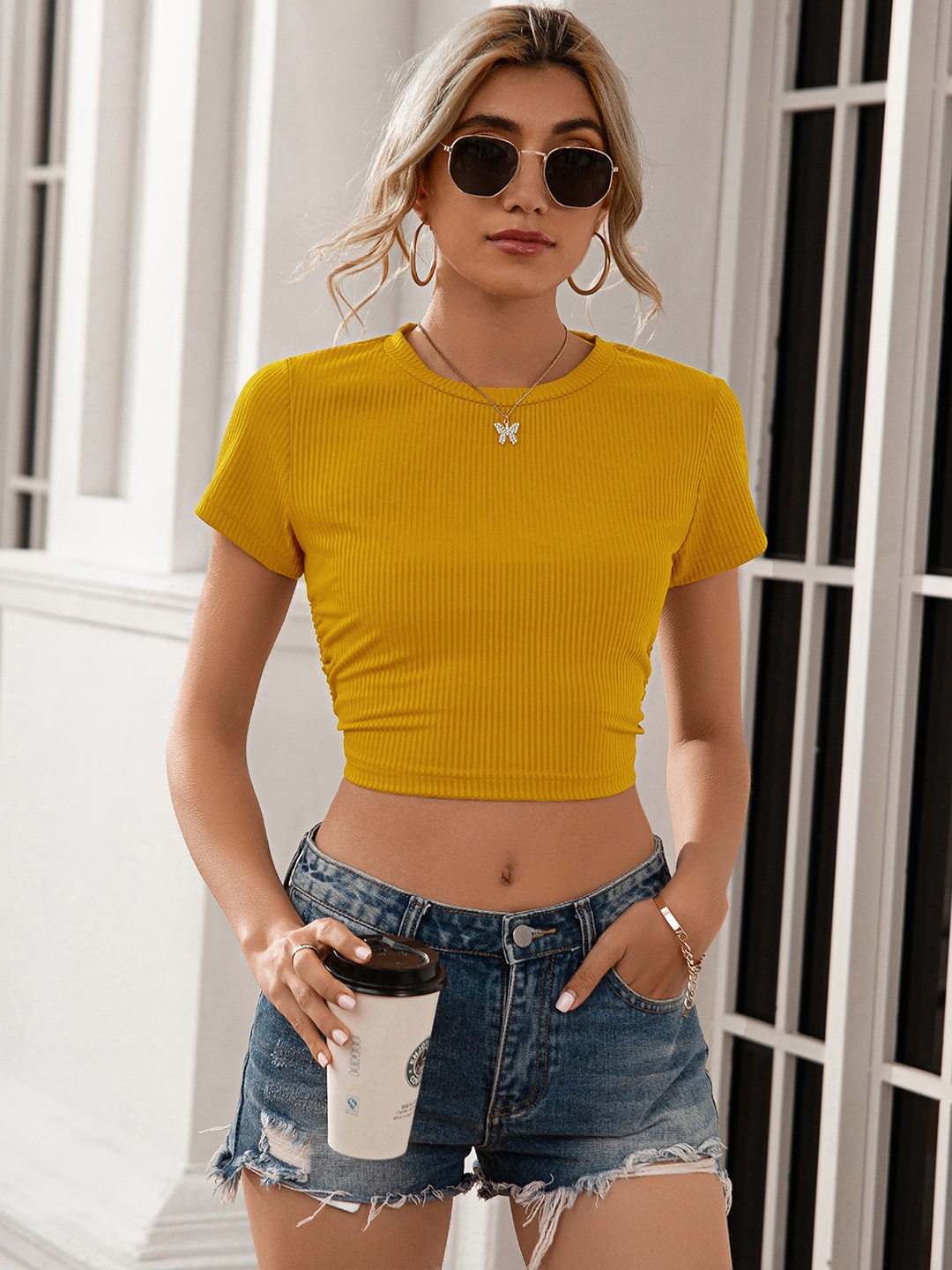 

URBANIC Yellow Styled Back Crop Top