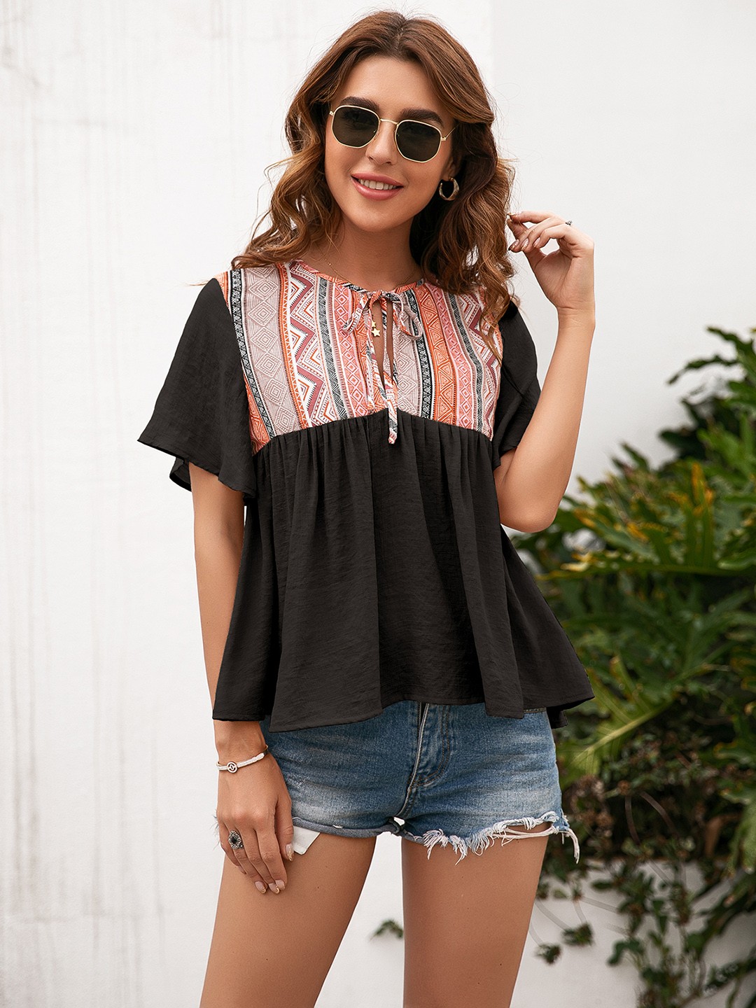 

URBANIC Black & Pink Geometric Print Tie-Up Neck Top