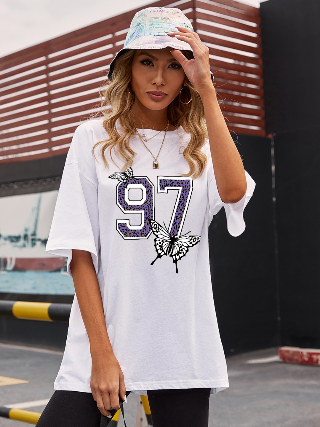 

URBANIC Women White & Black Pure Cotton Printed Drop-Shoulder Sleeves T-shirt
