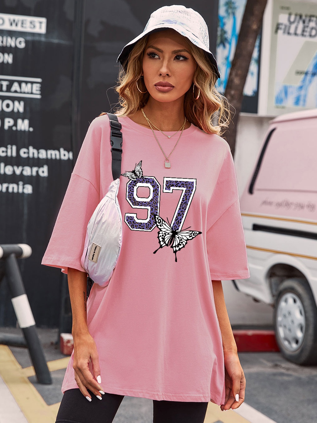 

URBANIC Women Pink & Black Pure Cotton Printed Drop-Shoulder Sleeves T-shirt