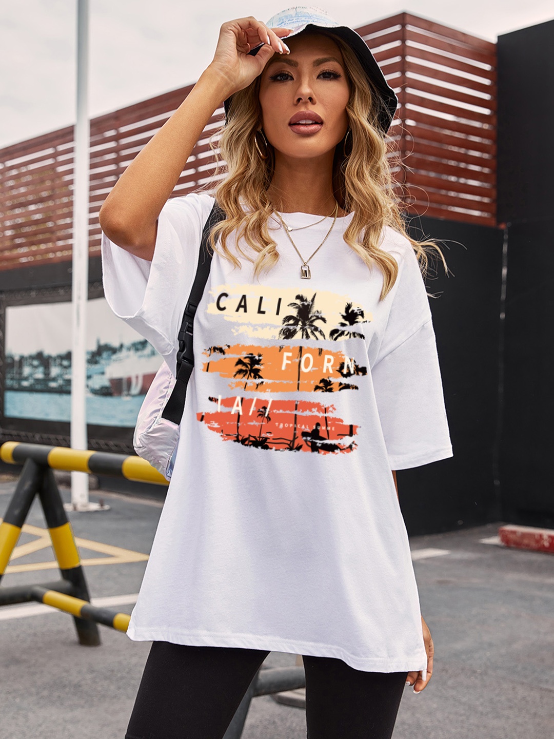 

URBANIC Women White Relaxed Fit Printed Drop-Shoulder Sleeves T-shirt