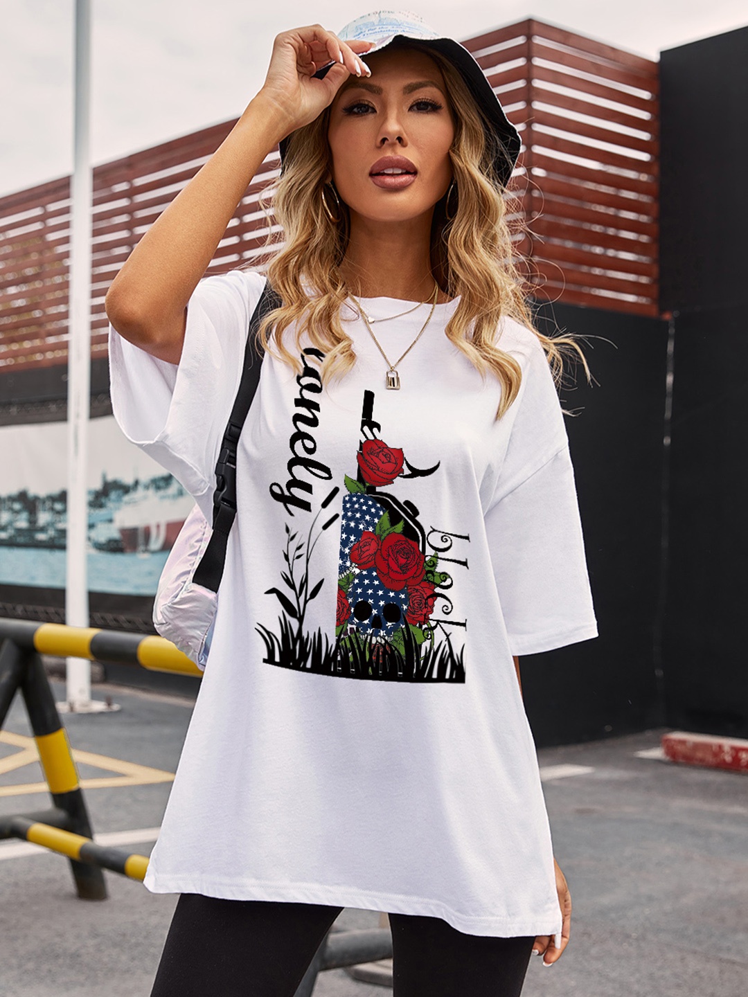 

URBANIC Women White Printed Drop-Shoulder Sleeves Relaxed Fit Longline T-shirt