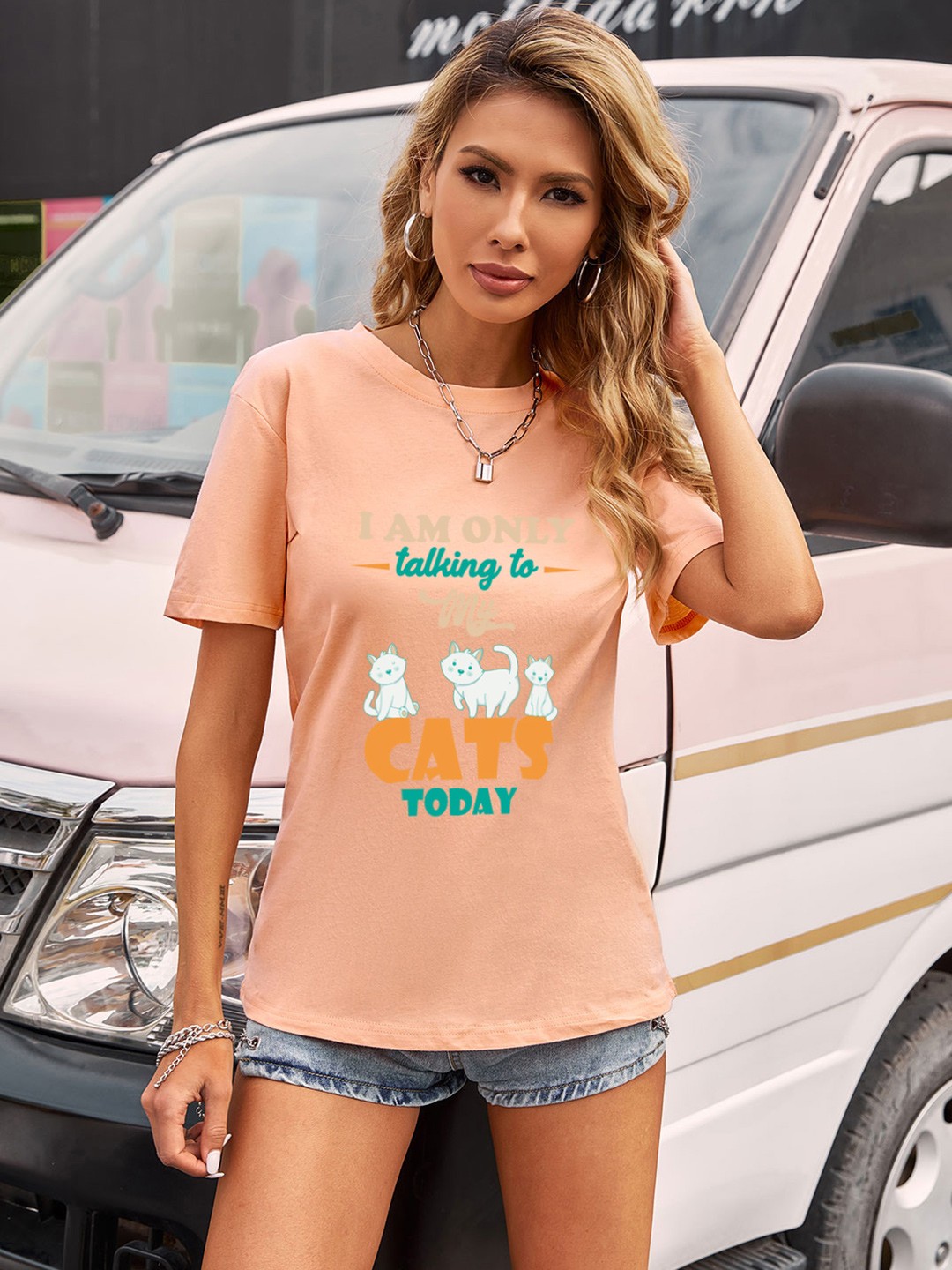 

URBANIC Women Orange & Blue Typography Printed Drop-Shoulder Sleeves T-shirt