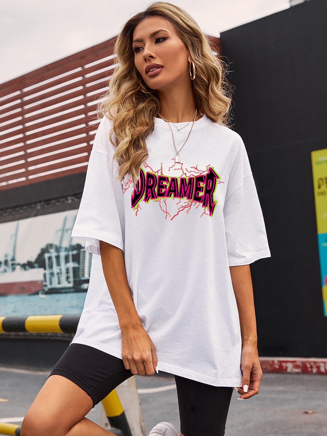 

URBANIC Women White Printed Drop-Shoulder Sleeves Relaxed Fit Longline T-shirt
