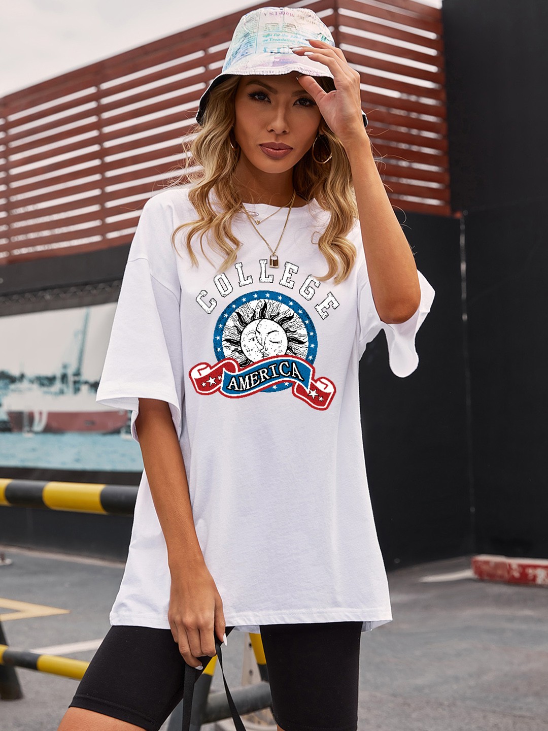 

URBANIC Women White Typography Printed Drop-Shoulder Sleeves T-shirt