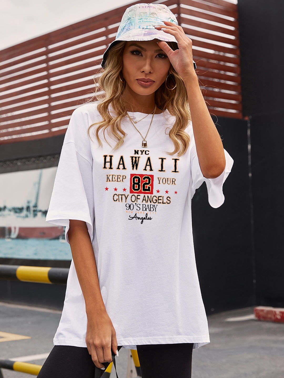 

URBANIC Women White Cotton Printed Drop-Shoulder Sleeves Longline T-shirt