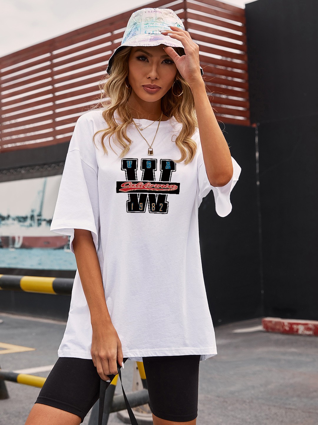 

URBANIC Women White Typography Printed Extended Sleeves T-shirt