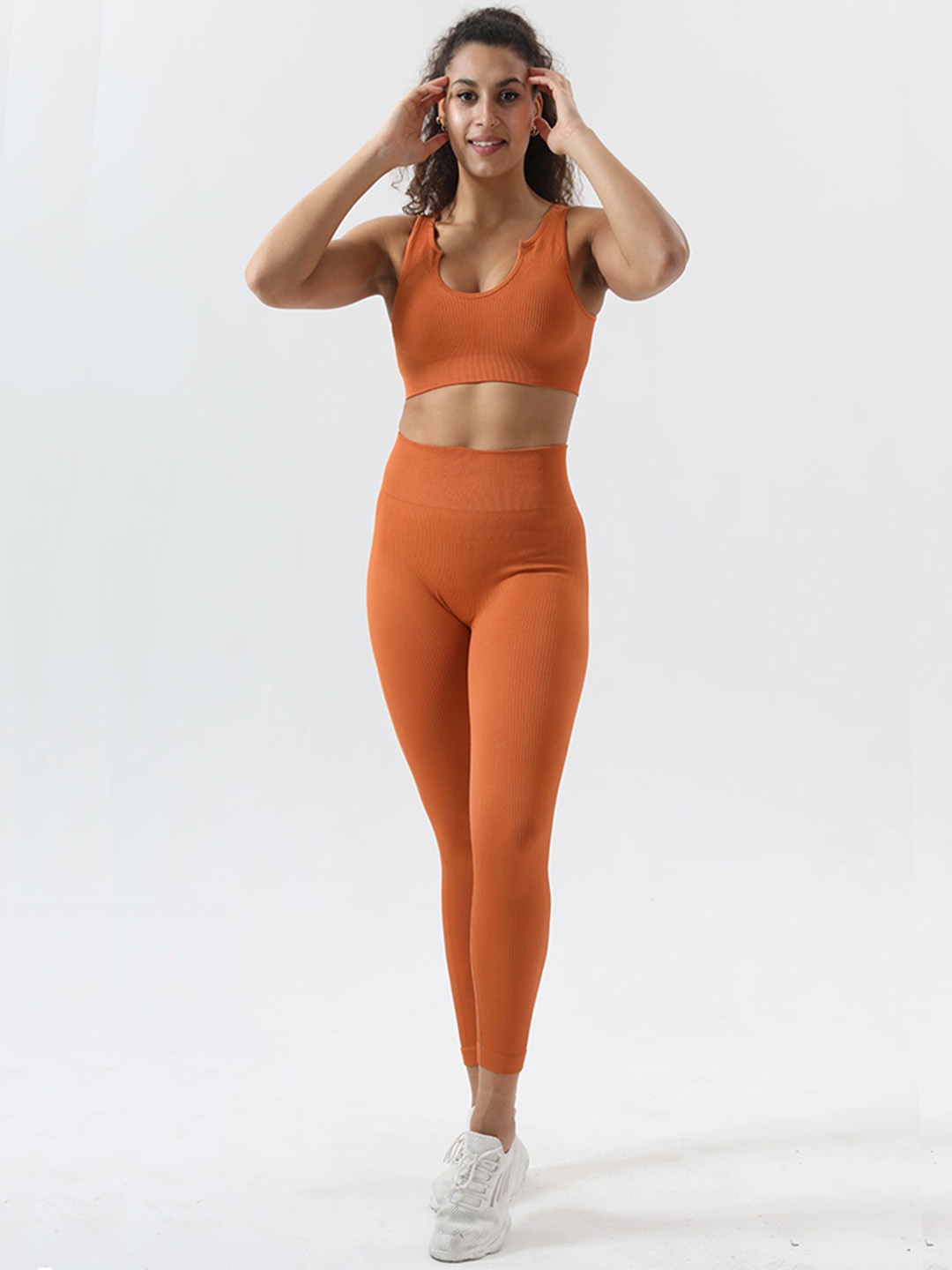 

URBANIC Women Orange Solid Slim Fit Gym Track Suit