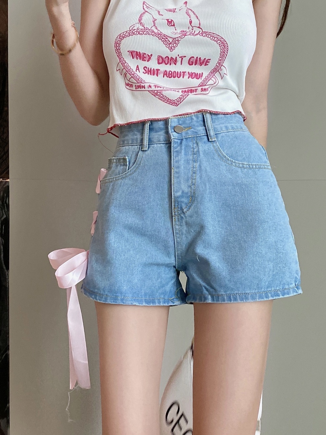 

URBANIC Women Blue Washed Straight Fit Cotton Denim Shorts with Lace Up Detail