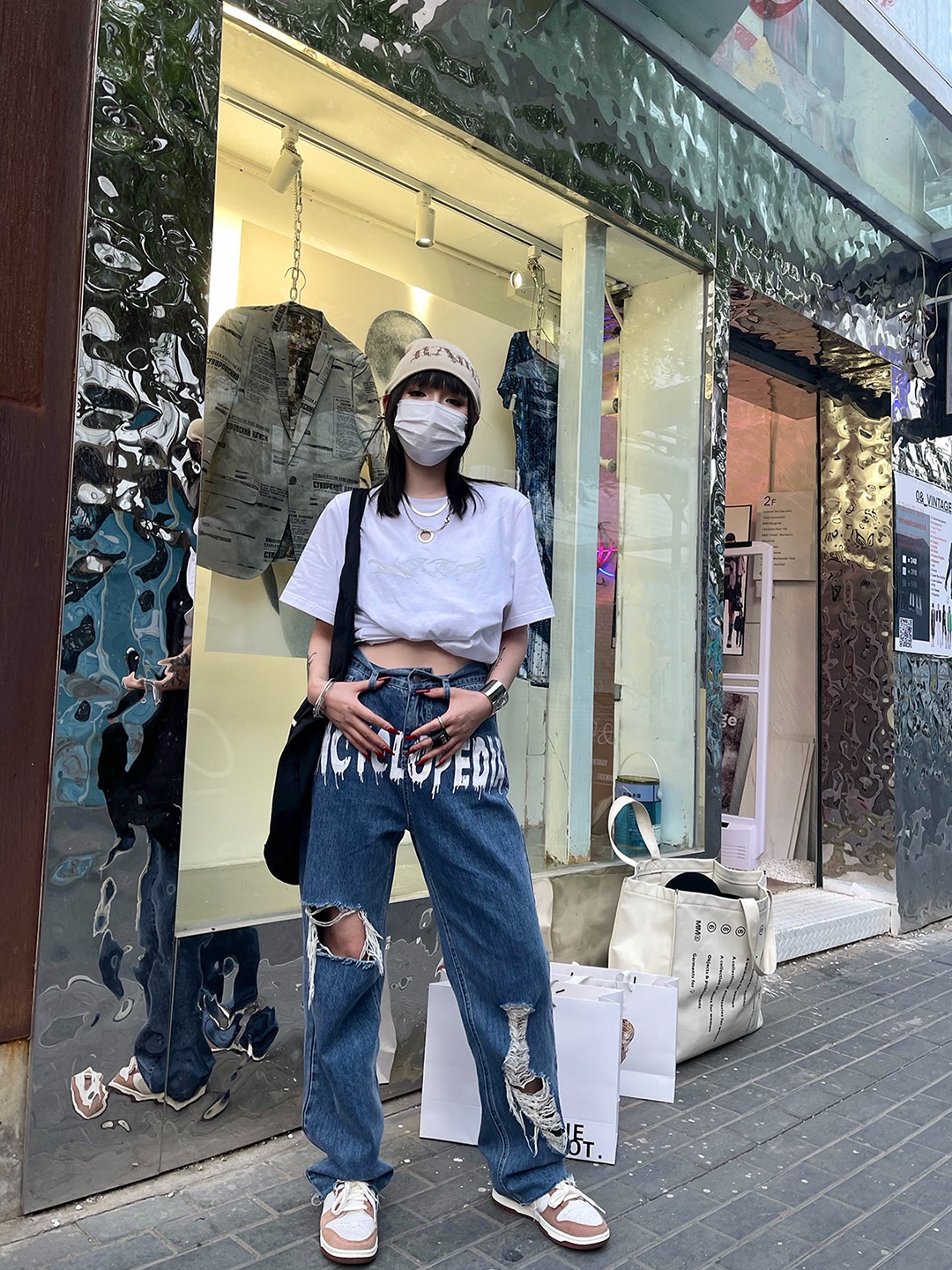 

URBANIC Women Blue & White Typography Print Straight Fit Highly Distress Light Fade Jeans