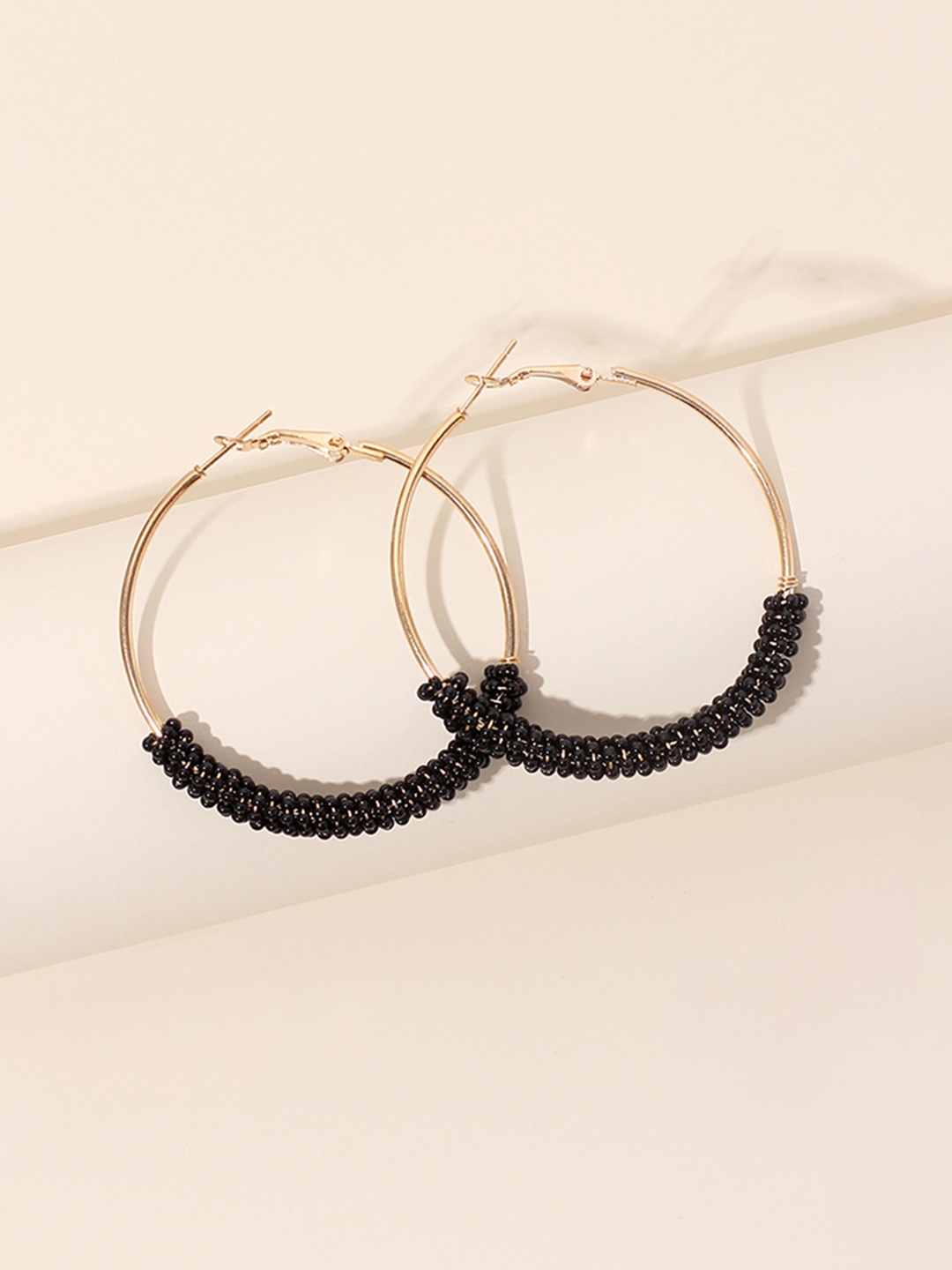 

URBANIC Black & Gold-Toned Beaded Circular Hoop Earrings