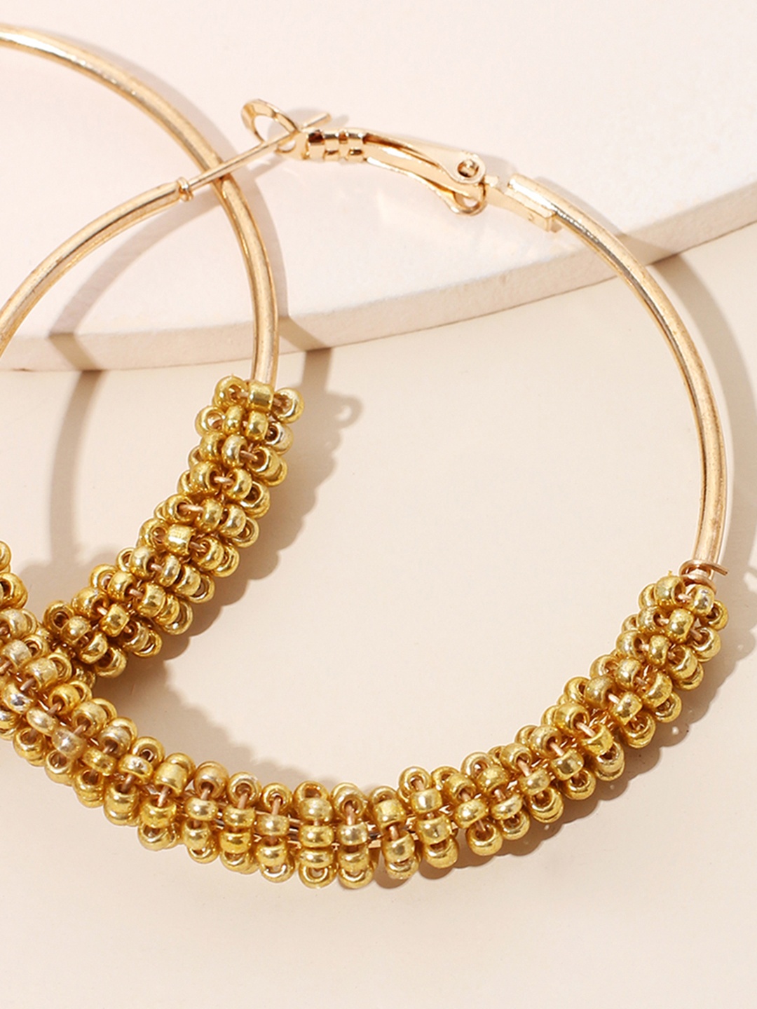 

URBANIC Gold-Toned Beaded Circular Hoop Earrings