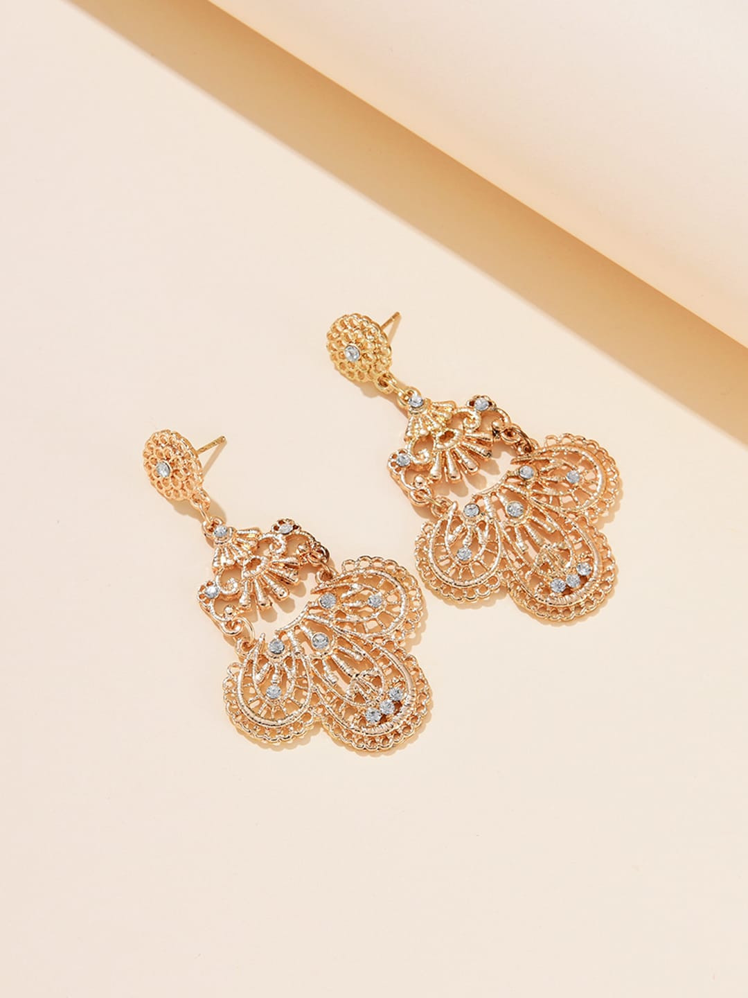 

URBANIC Gold-Toned Stone-Studded Contemporary Drop Earrings