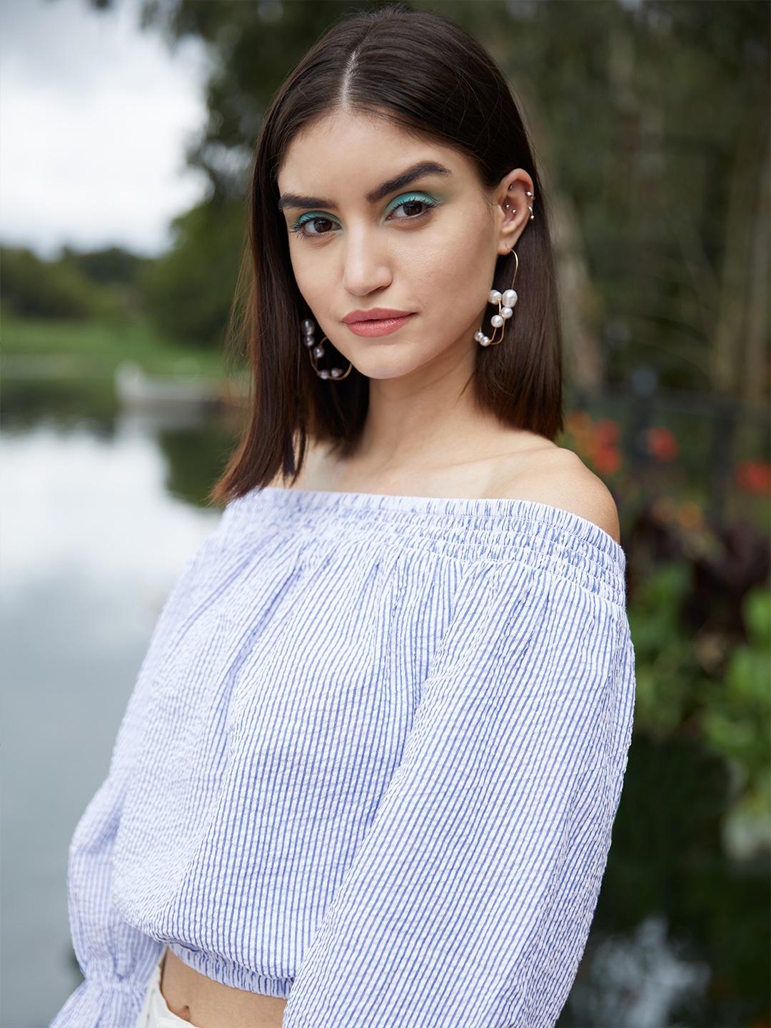 

URBANIC Gold-Toned & Off White Beaded Quirky Drop Earrings