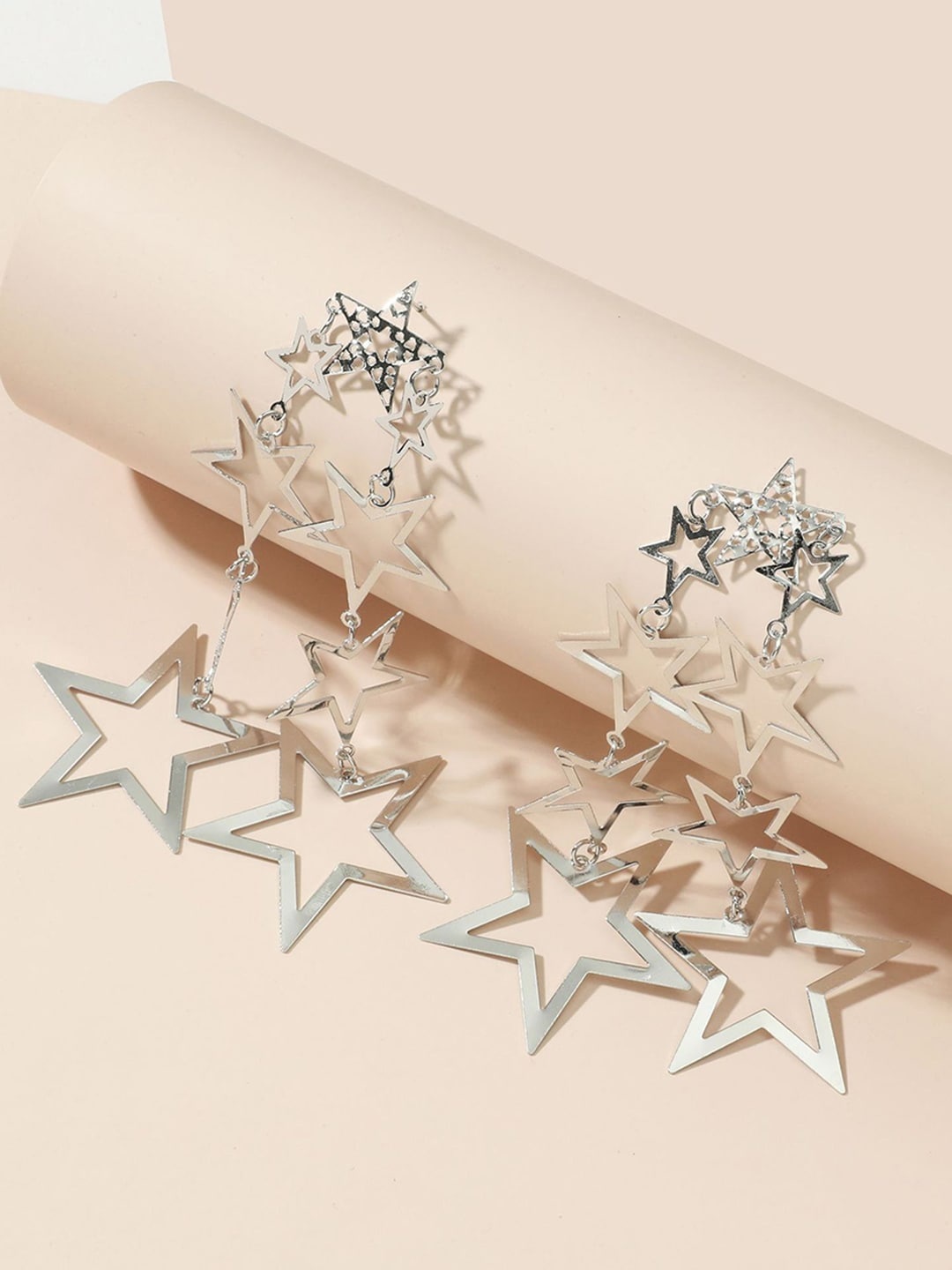 

URBANIC Silver-Toned Star Shaped Drop Earrings