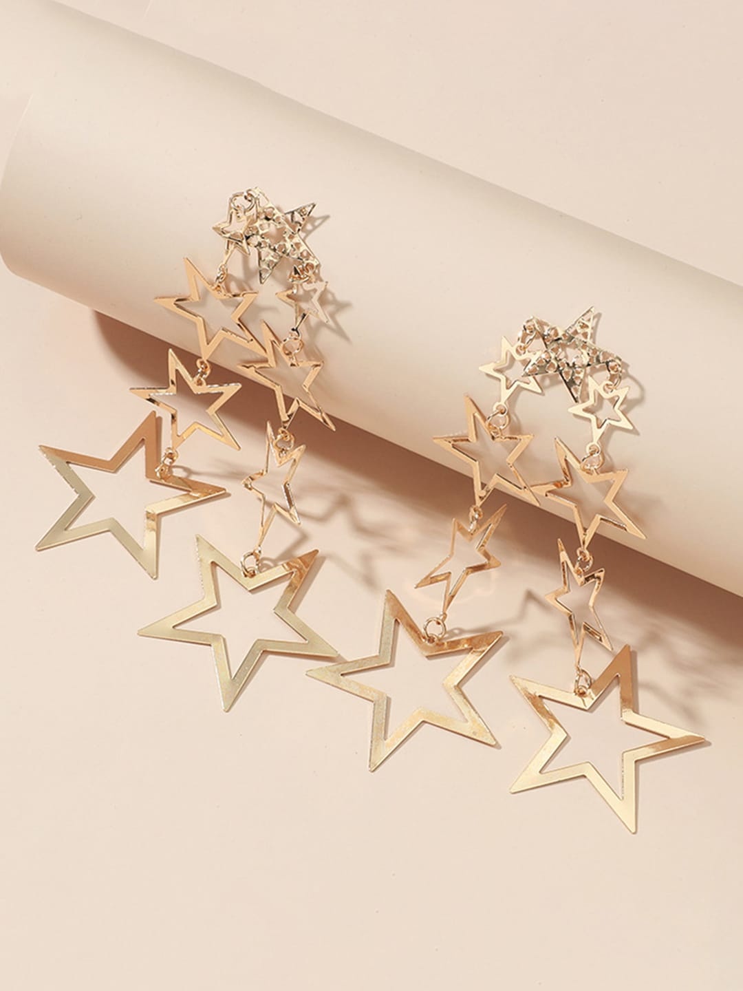 

URBANIC Gold-Toned Star Shaped Drop Earrings