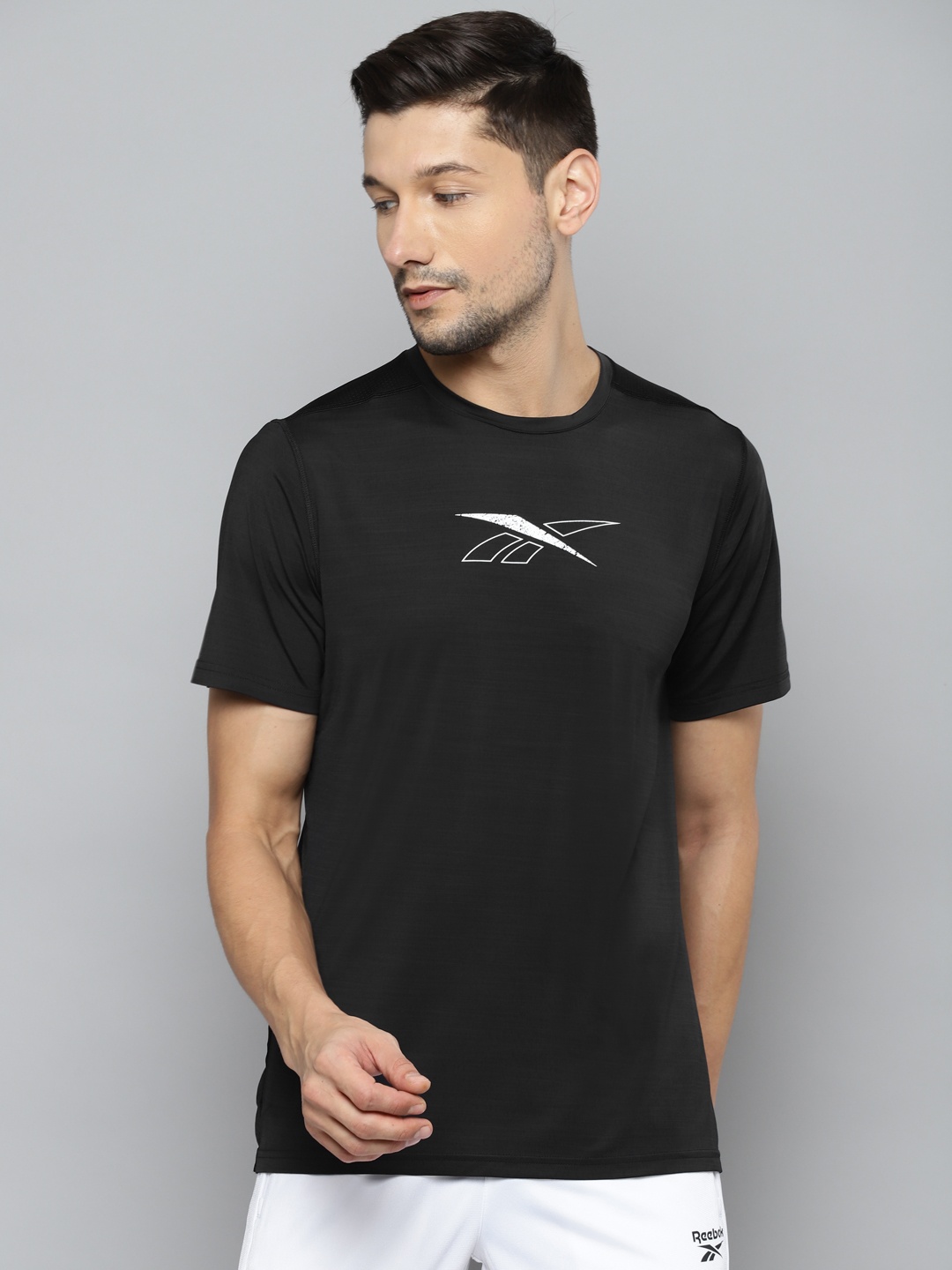 

Reebok Men Black & White Brand Logo Printed Slim Fit T-shirt