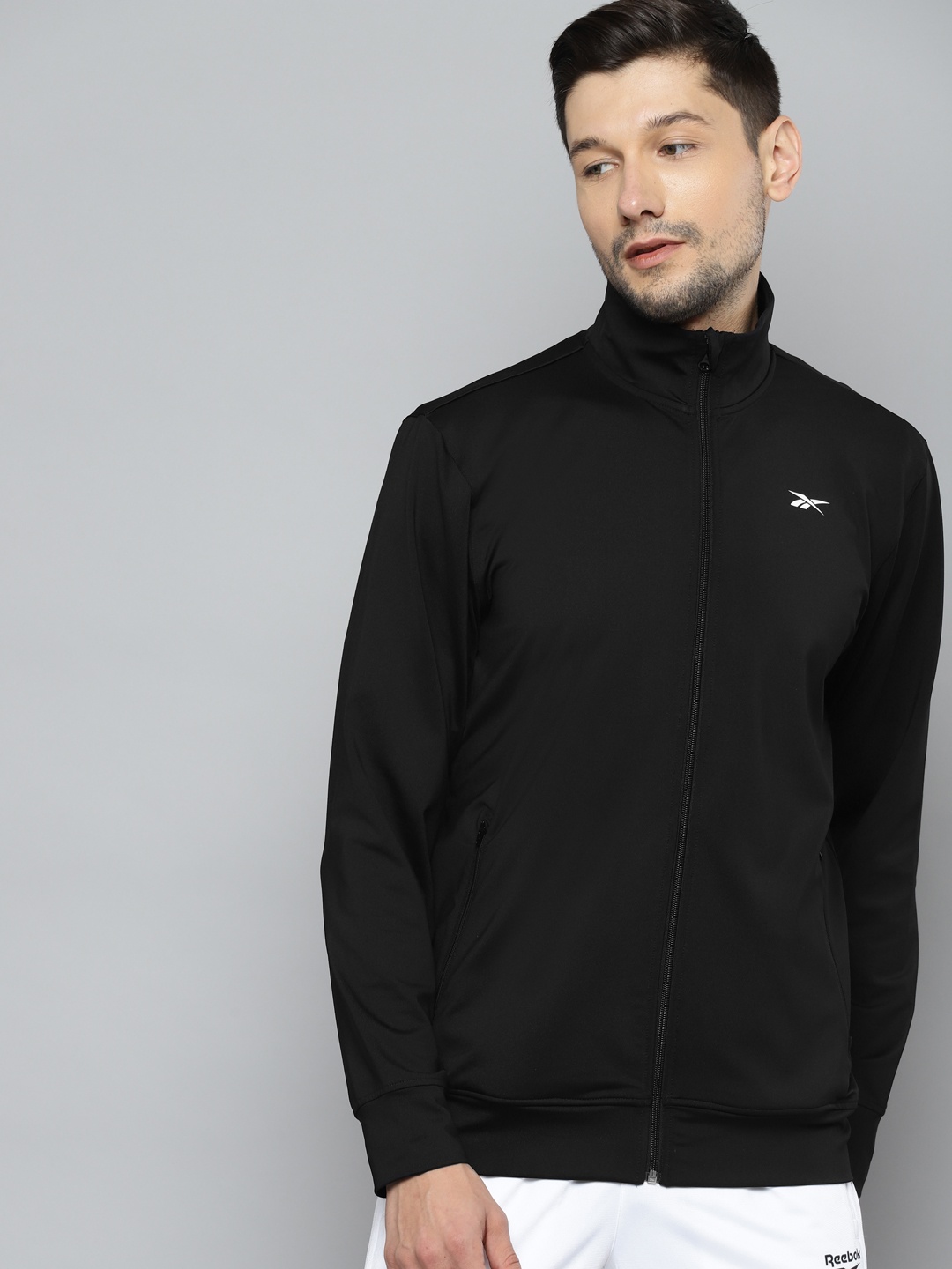 

Reebok Men Black Solid Training Fitness Track Sweatshirt