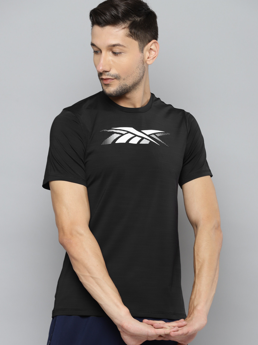 

Reebok Men Black Brand Logo Printed Monochrome Regular Fit T-shirt