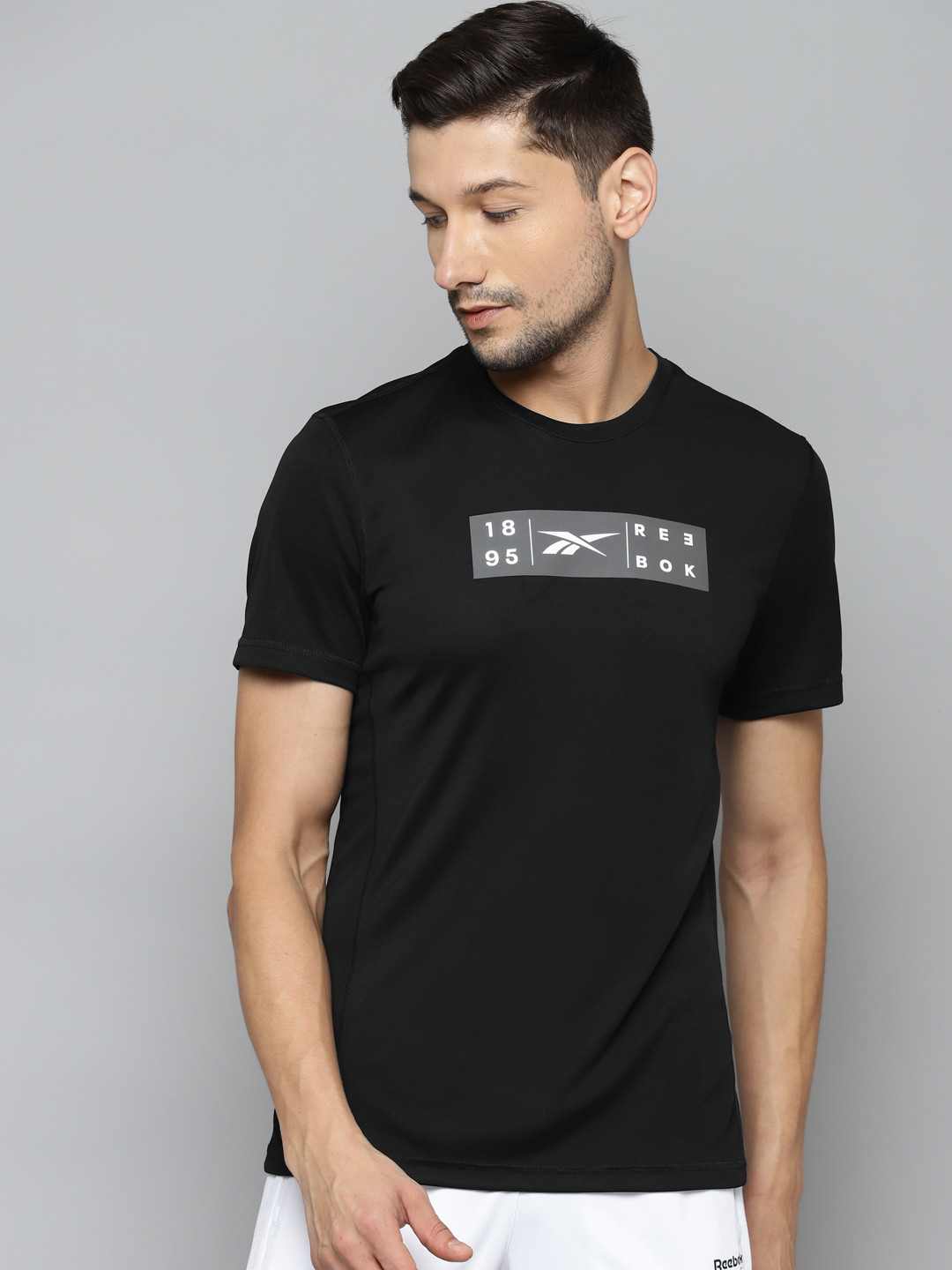 

Reebok Men Black & Grey Brand Logo Printed Speedwick T-shirt