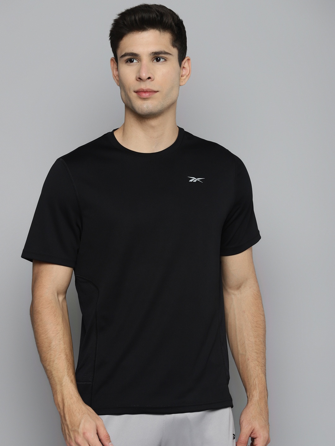 

Reebok Men Black Speedwick Solid Running REECYCLED + SPEEDWICK T-shirt