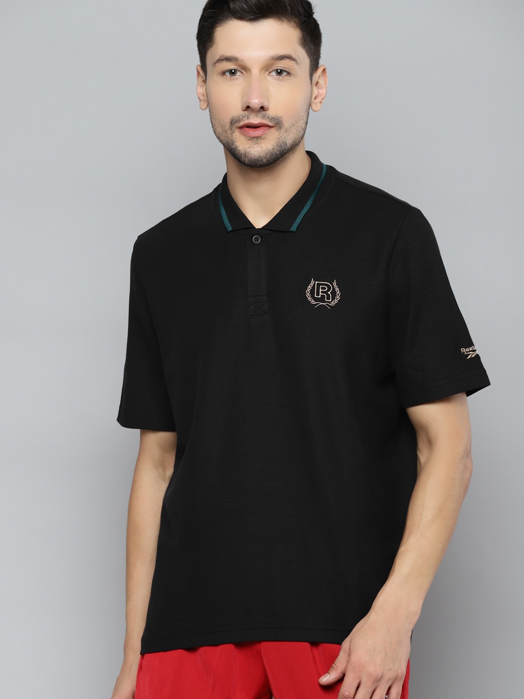 

Reebok Classic Men Black Pure Cotton Classics Golf Polo Shirt