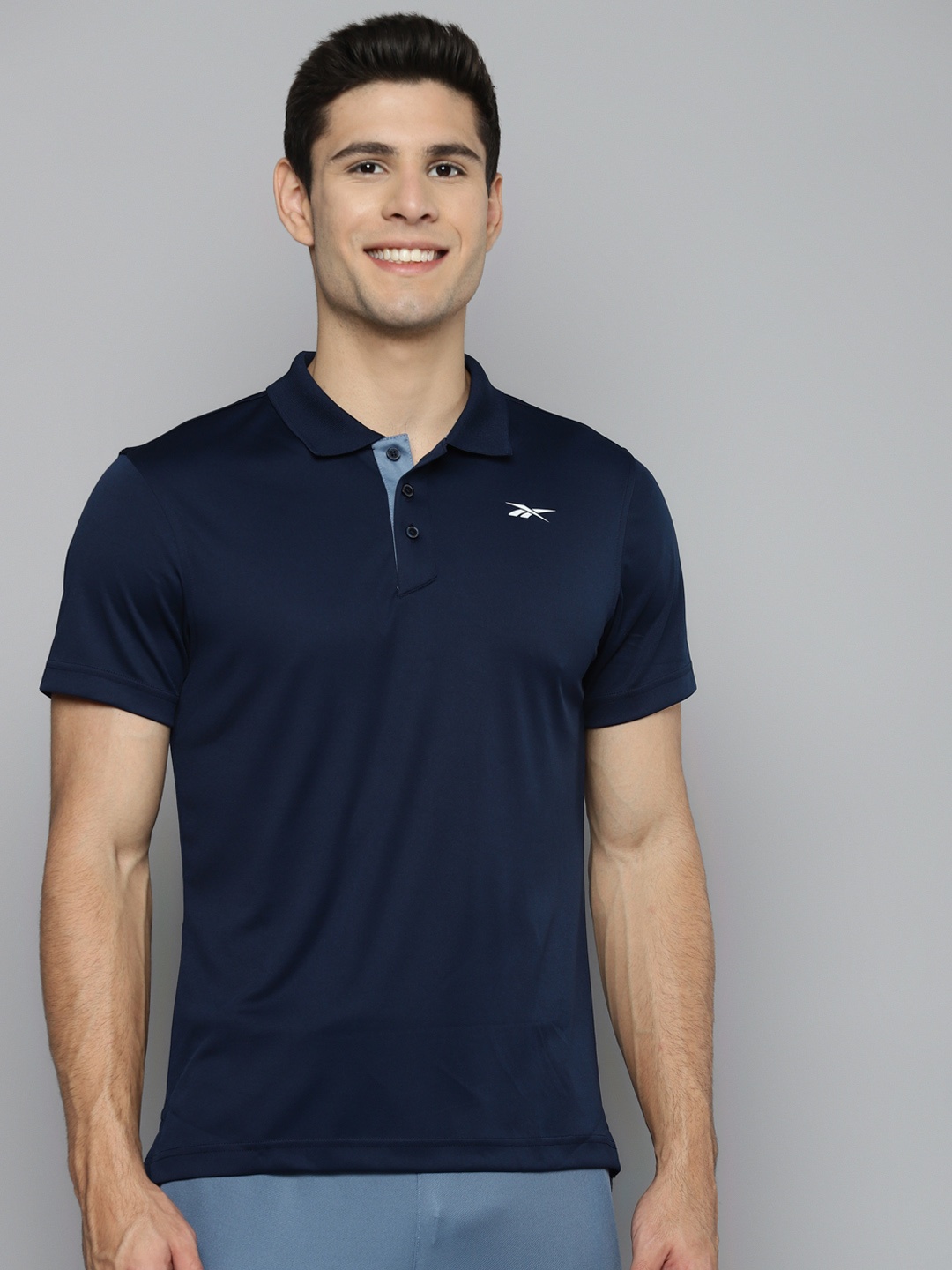 

Reebok Men Navy Blue FND Vector Polo Collar Slim Fit T-shirt