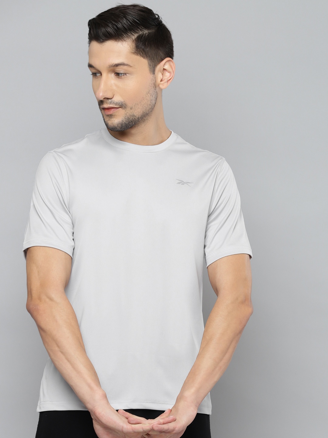 

Reebok Men Grey Solid T-shirt