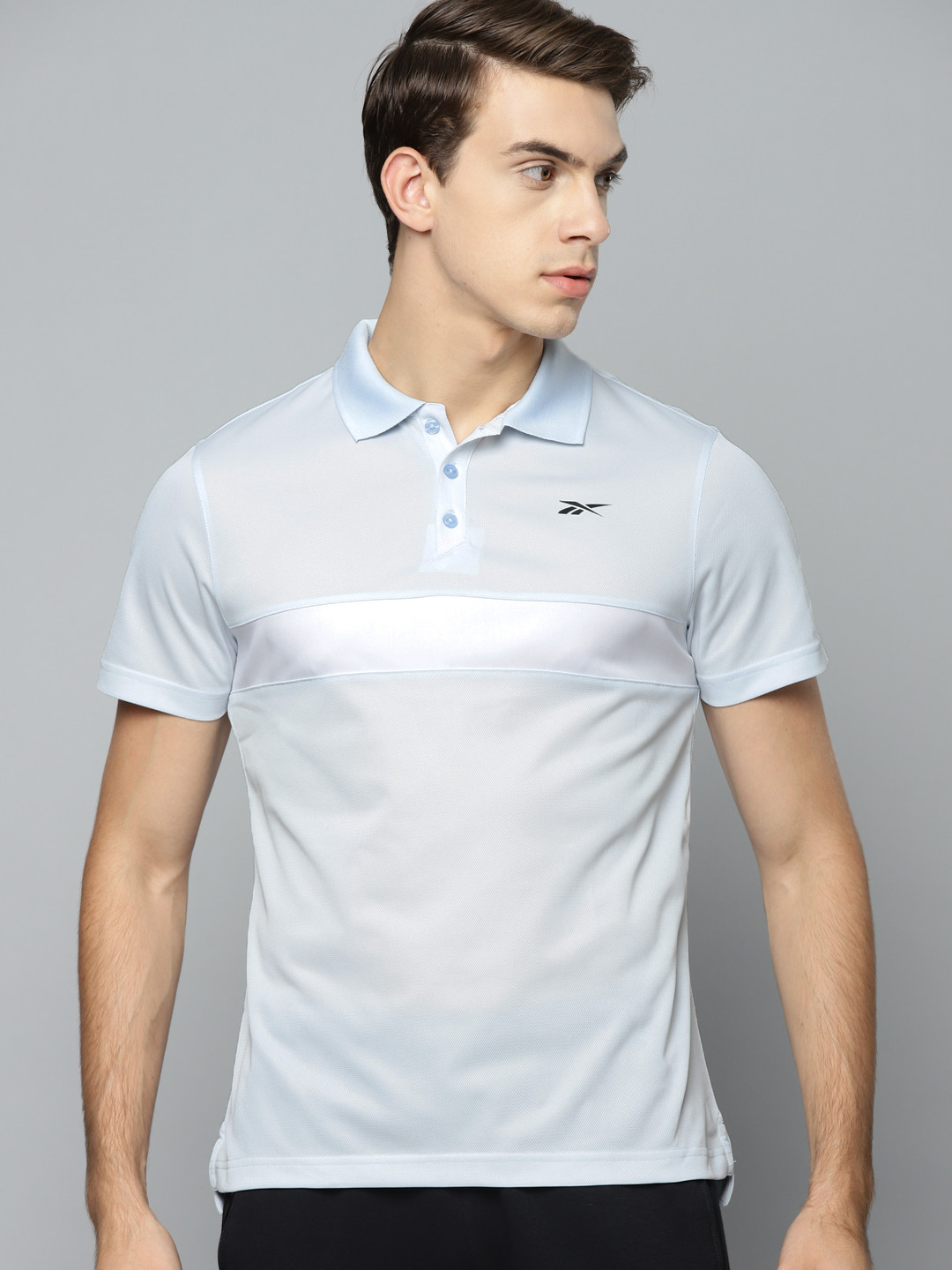 

Reebok Men Blue Colourblocked Polo Collar Speedwick T-shirt