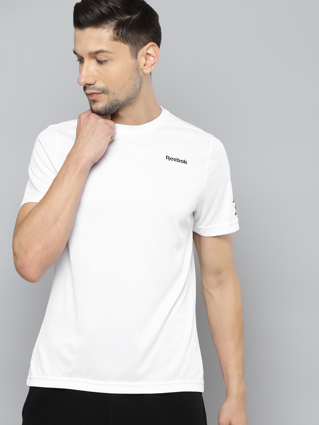 

Reebok Men White Solid Foundation Mesh Speedwick Training T-shirt