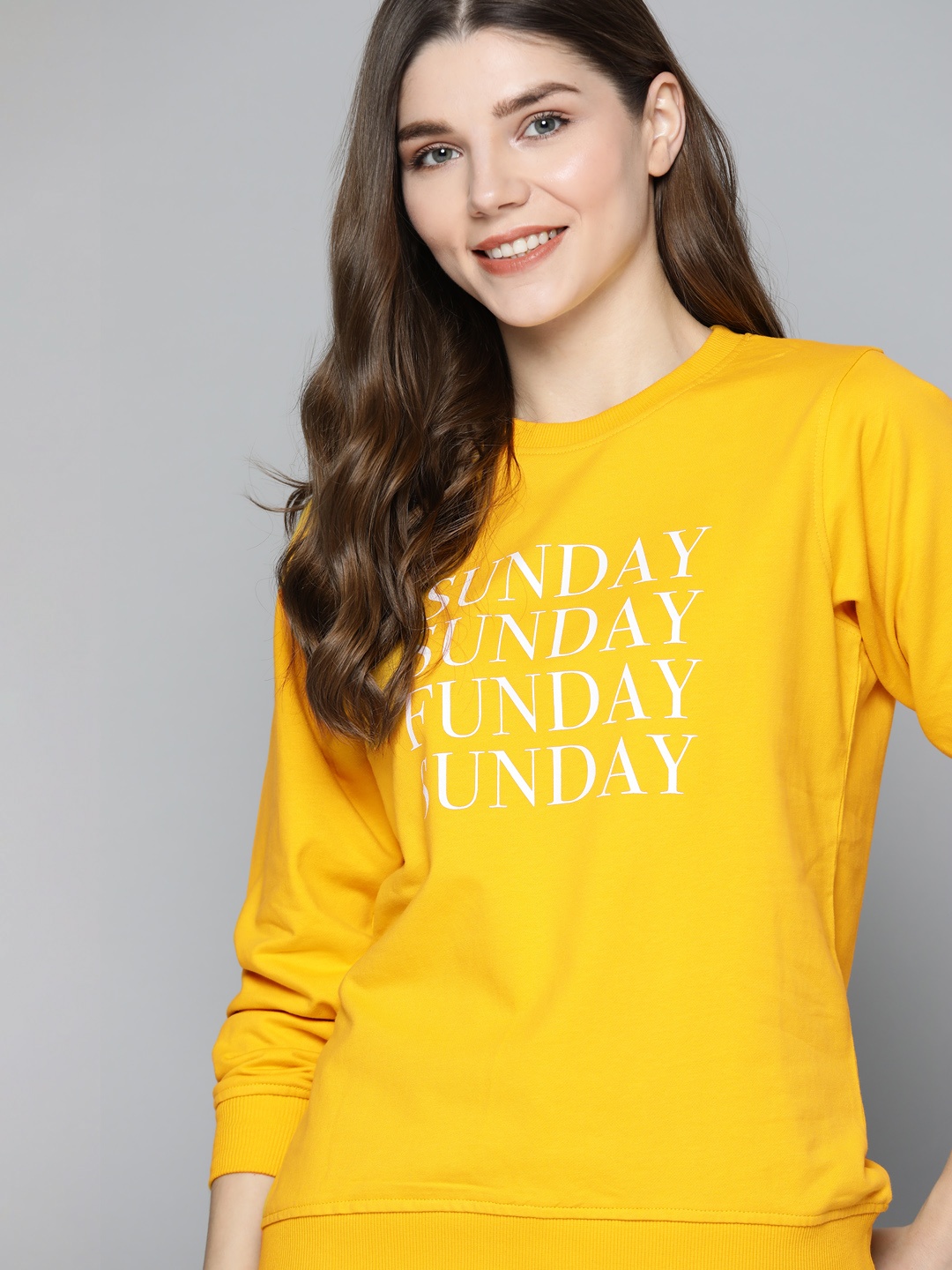 

Mast & Harbour Women Yellow Pure Cotton Typography Printed Sweatshirt