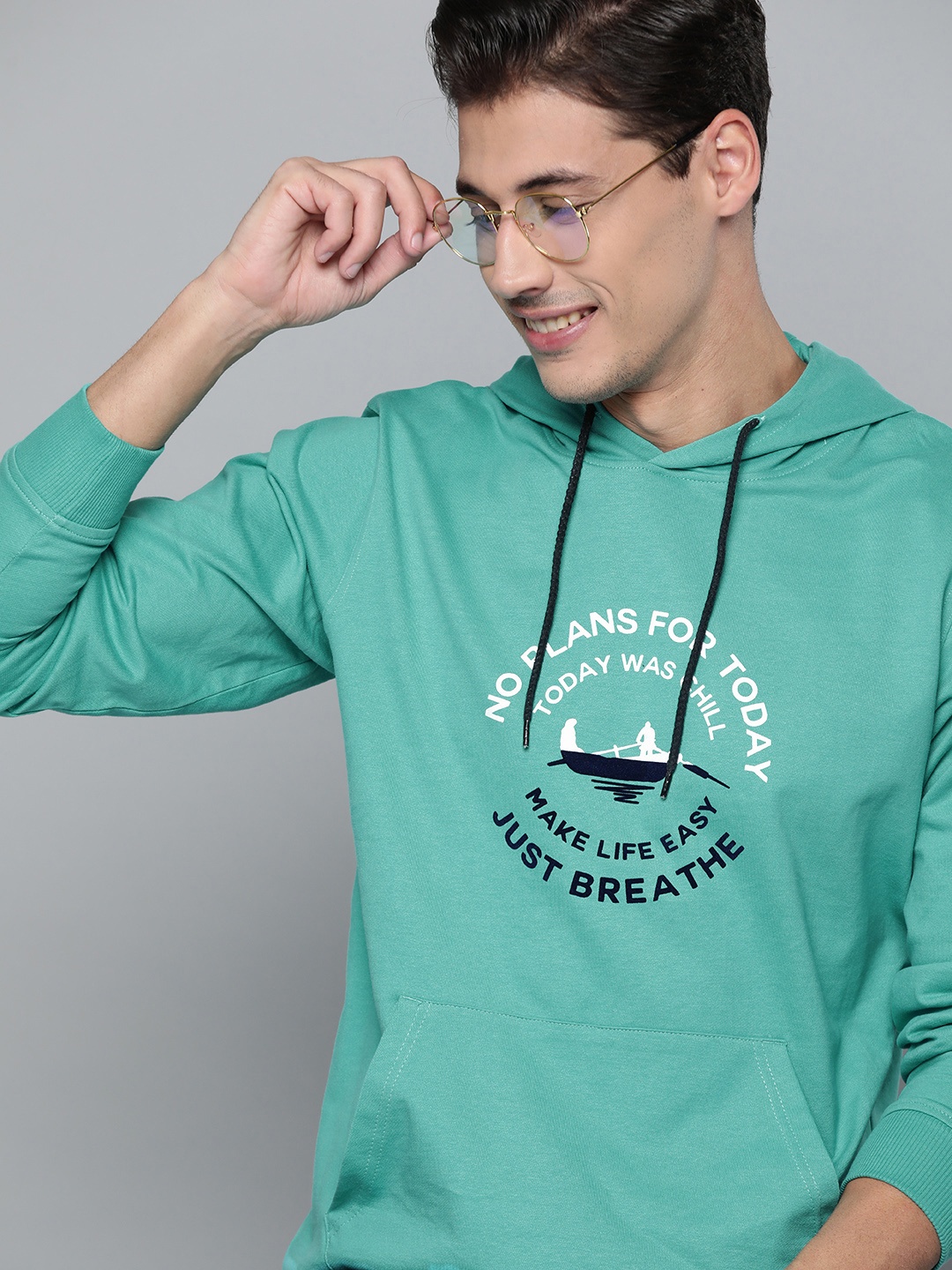 

Mast & Harbour Men Sea Green Pure Cotton Printed Hooded Sweatshirt