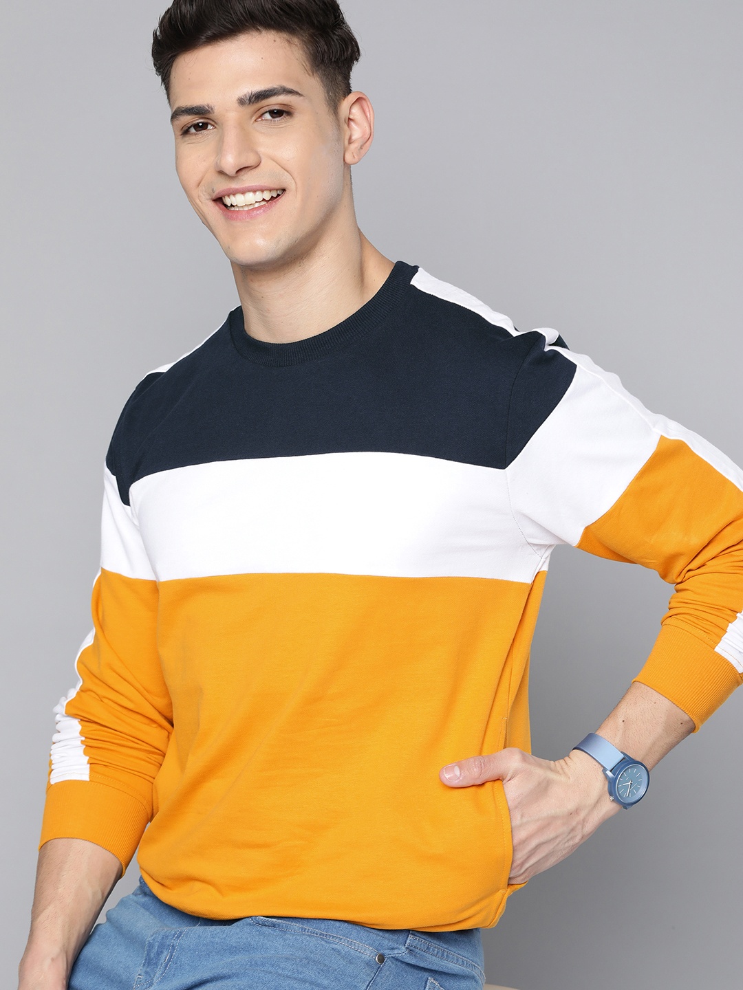 

Mast & Harbour Men Mustard Yellow & Navy Blue Colourblocked Cotton Sweatshirt
