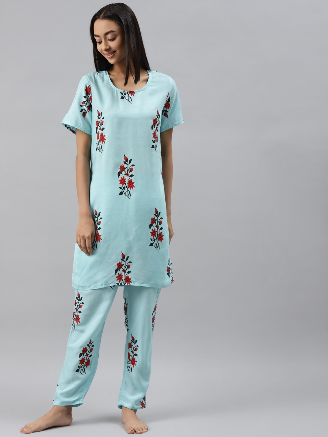 

Meeranshi Women Turquoise Blue Floral Printed Night suit