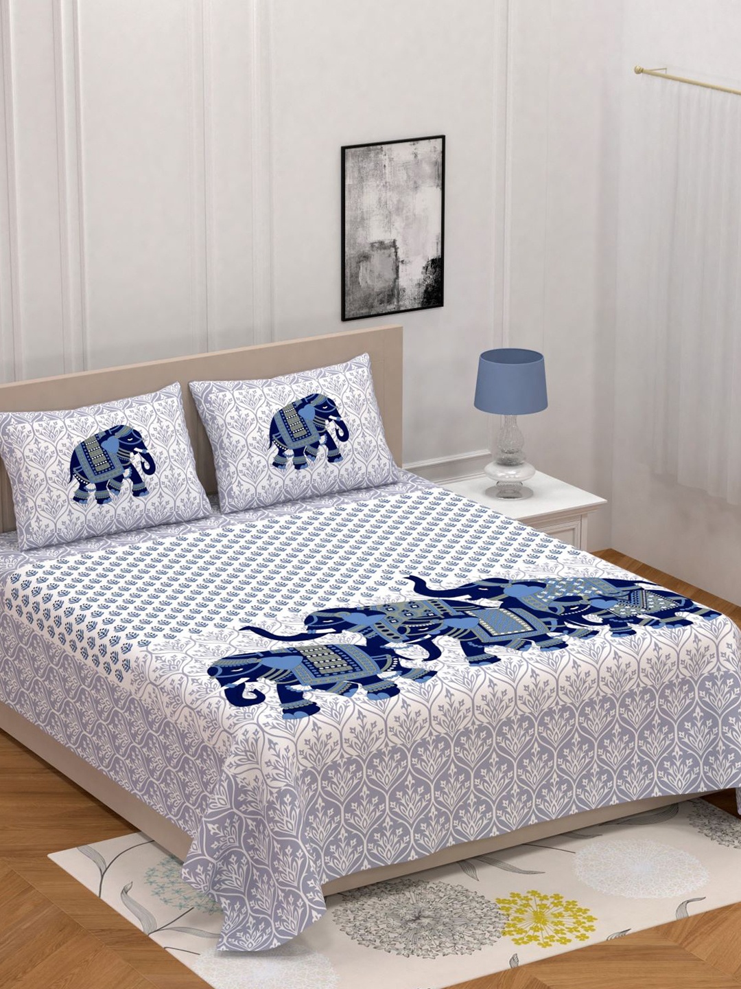 

Varde White & Blue Ethnic Motifs 104 TC Queen Bedsheet with 2 Pillow Covers